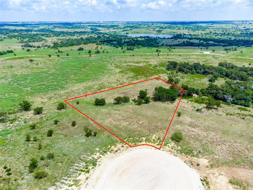 This 1.95 acre wedge shaped lot gives you plenty of room to spread out! Many trees at back of property & located on end of cul-de-sac. You also become a member of a private, gated six acre lake club offering clubhouse with game tables, kitchen & baths, sports court, picnic areas with tables and grill and pier and boat ramp.