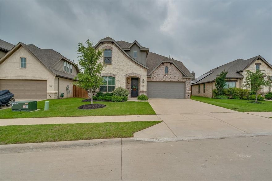 Welcome to 4621 Mills Falls Drive—where thoughtful upgrades, space, and natural beauty come together in one of Crowley’s most desirable communities.

Situated on a larger lot, this home offers a rare backyard setting backing to mature trees and a creek, creating both privacy and a peaceful view you don’t often find in newer construction. Inside, the home truly lives like new—but better—featuring real wood cabinetry, engineered hardwood flooring throughout the main level, and elevated finishes that go well beyond typical builder-grade homes.

Designed with comfort and functionality in mind, the home includes dual-zone HVAC with separate temperature controls for upstairs and downstairs, along with two 50-gallon gas water heaters to keep up with daily demand. The gas fireplace offers flexibility for cozy evenings—whether you prefer the look of real wood or the ease of gas.

Upstairs, every bedroom includes a walk-in closet, complemented by two oversized storage closets for added convenience. You’ll also find full door access to a floored attic space above the garage—ideal for easy-access storage.

This home is loaded with premium upgrades, including:

* Insta-hot water and reverse osmosis filtration at the kitchen sink
* RainSoft whole-home water treatment system (approx. $15K value)
* Clean Start ozone laundry system for high-efficiency, detergent-free cleaning
* 220V EV charging station in the garage
* Hardwired security system for all downstairs windows and doors
* Ceiling fans installed in bedrooms

Enjoy an active lifestyle with community amenities just a short walk away, including a pool, walking trails, park, and soccer field—with additional amenities like a second park and basketball court planned.

Conveniently located near the Chisholm Trail Parkway, this home offers quick access to shopping, dining, and entertainment, including nearby retail developments like Target, BJ’s Wholesale, and a proposed HEB.