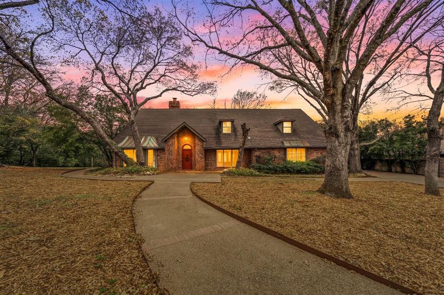Elegance and natural light fill every space of this thoughtfully designed home featuring a formal dining room, spacious family room, and a breakfast room perfect for everyday living and entertaining. Every room is oversized and well thought out, offering comfort and functionality. The kitchen showcases granite countertops, abundant cabinet space and generous prep areas. A gorgeous study with a full bath offers flexibility and could easily function as a second primary or guest suite. The impressive primary suite features a sitting area, cedar closet, garden tub, and double vanities creating a relaxing retreat. Walk-in closets throughout the home provide exceptional storage and convenience. There is also an elevator which is so beneficial to many. Situated on one of the best lots in the community, this home offers beautiful tree views, wonderful privacy, and exceptional curb appeal. Enjoy minimal yard work and take advantage of being just a short walk to the community pool. A wonderful opportunity to own a beautiful home that combines timeless charm with easy living.