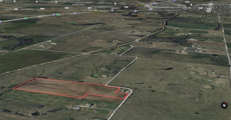 25 acres of level farm land with over 500 feet of road frontage.  Ag exempt. Possible uses include a single family homestead, development, farming, or investment.  Easy access to I-35 and FM 2071.   Electricity is available.  Deed restrictions to include: No commercial business unless agriculture related. No mobile homes or portable homes.  No structure over 70 feet tall.