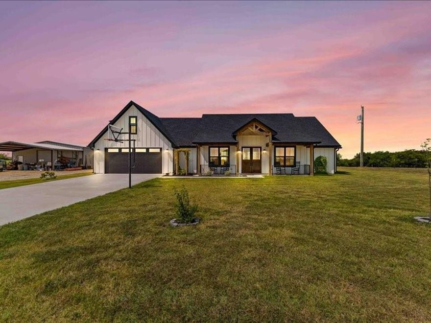 This is the Texas Dream! Modern open concept farmhouse built by JoCo Builders on 7 acres in Lorena. (This is a unicorn in my opinion but you can decide) The main house offers 4 spacious bedrooms, 3.5 bathrooms  and 2 large bonus rooms upstairs. The kitchen has over sized, high end appliances and a butler pantry with the most beautiful pocket door.  The isolated primary suite has a double-sided fireplace, spa-like bath, and private patio access. Spacious secondary bedrooms include a Hollywood bath with personal vanity areas and a built in bunk bed with rails to maximize floor space. Walk in closets have built in storage; Separated guest hall has plenty of room for your guests to relax and a bathroom with walk-in shower. There is even a special built in area near the laundry room for your best fur babies to relax in their own space made for them.  The sellers have utilized every bit of space.  Everything is practical and useful but also elegant and timeless.  The floor plan was well thought out and and executed to perfection.  Bonus rooms upstairs feature a half bath and balcony with the best sweeping sunset views, railing and gated stairs lead down to the pool and garden areas. True backyard oasis with secured pool and hot tub (glow in the dark details). 

3,000 sq. ft. insulated shop with water, electric, HVAC, bathroom, and kitchen area. 2,000 sq. ft. of workspace plus 1,000 sq. ft. apartment (double insulated) with 2BR, office, full kitchen, pantry, full bath, and laundry. Outside city limits make it ideal for multi-generational living or income producing rental. NO HOA!
Disk golf course on neighboring property. There is also a vineyard nearby on Country Springs.  What more could you want? This is a must see.  Schedule your private tour today.