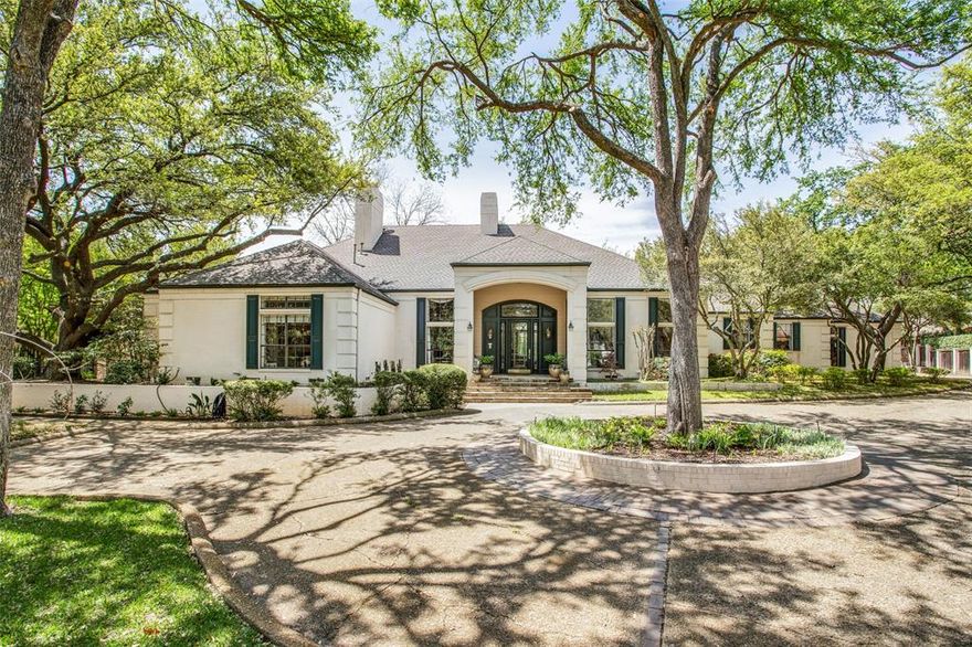 Gracious North Dallas estate offers one-of-a-kind amenities in a private location. Beautiful single story 4 bedroom home with 4 car garage features an ideal floor plan, tall ceilings, elegant living and dining areas and tons of natural light throughout. White cabinet island kitchen is open to the sizable family and breakfast rooms. Oversized game room and an abundance of storage. Expansive covered patio overlooks the sparkling pool and outdoor living area. Full separate guest house complete with kitchen, living room, bedroom and bath. This property is a hobbyist's dream with a full workshop plus a huge upstairs space being used as a home gym. Could be an excellent work-from-home opportunity. Lush grounds with gorgeous landscaping, peaceful gardens and a circular drive with security gates. Truly remarkable in the coveted Williamsburg neighborhood.