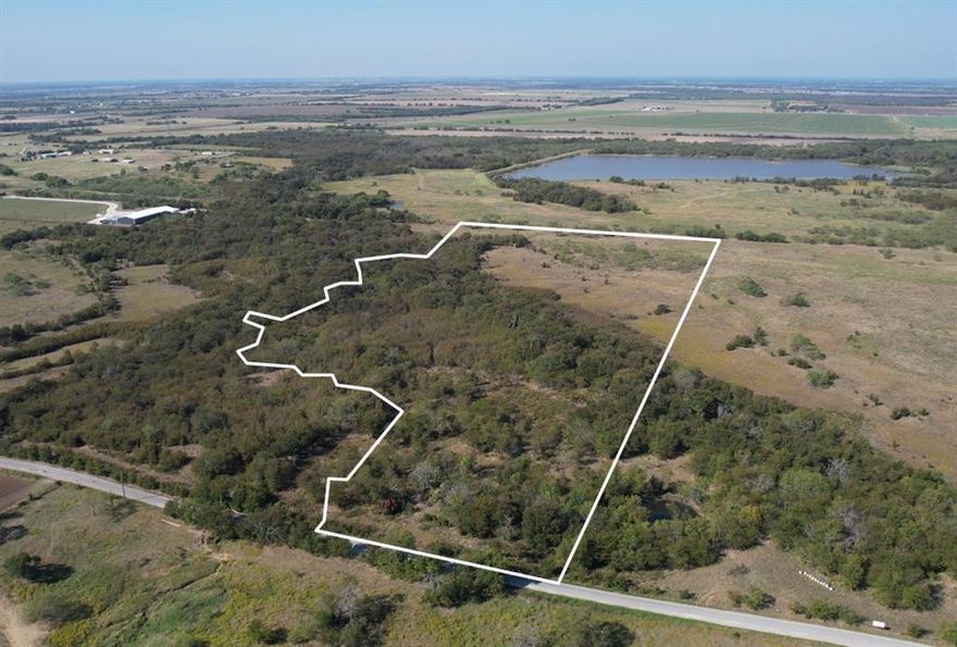 Explore the endless possibilities with this breathtaking 22-acre property in Gunter, Texas. Experience a property teeming with lush trees that offer shade, privacy, and a vibrant natural environment. This property is a blank slate that gives the new owner the opportunity to remove the trees they want removed and keep the ones they would like to keep. One can truly make this property whatever they would like it to be. A beautiful creek meanders along the southern boundary of the property, providing a peaceful escape. The rolling hills and varied terrain create multiple potential building sites, each offering unique perspectives of the landscape. Currently the property has an Agriculture exemption and is large enough that this can be maintained if the new owner would like to maintain it. Perfect for creating a secluded retreat, small ranch, or a picturesque weekend getaway, this land is perfect for anyone seeking to build their own slice of paradise.