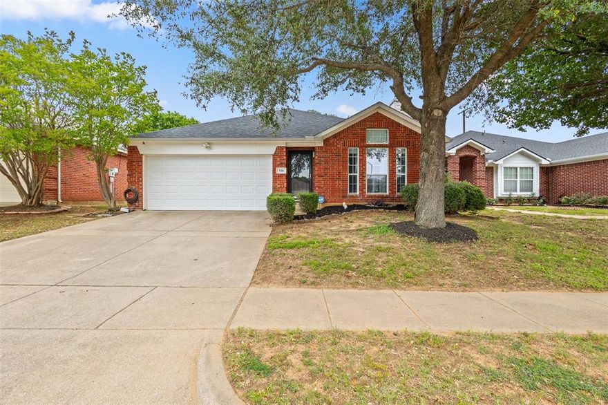 Rarely do homes in this price point offer a backyard setting this peaceful. Backing to a scenic cattle and horse farm, this charming Fort Worth home enjoys open views and a sense of privacy that’s hard to find, while still being conveniently located near I-30 and Loop 820 for easy access to both Dallas and Fort Worth. Mature trees, added landscape lighting, garden features, and backyard swings create an inviting outdoor space perfect for relaxing evenings or quiet mornings at home. Updates include a recently replaced roof (2020), plus updated dishwasher, range, microwave, and water heater within the last few years. No carpet throughout the home adds both style and easy maintenance. Inside, the vaulted living room feels bright and spacious, centered around a cozy wood-burning fireplace that adds warmth and character to the space. The built-in surround sound system adds to the experience, making the living area ideal for movie nights or entertaining guests. The home offers 3 bedrooms, 2 bathrooms, and a functional layout well-suited for first-time buyers, downsizers, or anyone looking for low-maintenance living without sacrificing comfort. Located just a short walk from Mallard Cove Neighborhood Park, residents can enjoy fishing access, playgrounds, soccer fields, and jogging trails right in the neighborhood.