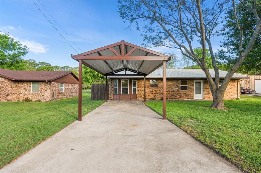 Updated and move-in ready, this 3-bedroom, 2-bath home in Saint Jo blends modern improvements with timeless character. Interior features include custom cabinetry, updated flooring, and a functional kitchen with ample storage and workspace. The spacious living area features a brick fireplace and a wood ceiling that adds warmth and character. Natural light enhances the open layout, creating a comfortable and inviting atmosphere. Outside, enjoy a generous backyard with mature trees, a covered patio, and an 8x10 storage building—ideal for additional storage or workspace. The property also includes a covered carport and plenty of space for outdoor living. Located in a quiet area of Saint Jo, this property offers small-town charm with practical updates, making it a great option for a primary residence or investment opportunity.