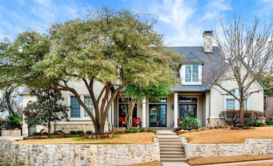 *OPEN HOUSE SATURDAY MARCH 14TH, FROM 1-4PM* Doesn't get better than this! Stunning 5 bedroom, 7 bath custom home on oversized lot with greenbelt behind and nature preserve with 2.5 mile Shady Brook Trail just outside your front door! Inside, you'll fall in love with the expansive covered front porch, open floor plan, complete with wood floors, neutral paint and meticulous attention to detail in every room.  Step inside the front door to sweeping view of the formal living room (with fireplace), dining room, vaulted ceiling and gracefully curved staircase with wrought iron balusters. Take in the view of the backyard through the window in the home office with built-ins, perfectly framed by the arched doorway. Past the office is the warm and inviting family room with a second fireplace, large windows showcasing the backyard and pool, wet bar, access to the media room and breakfast area! The chef's dream kitchen features everything you could want: professional Wolf gas range with 6 burners, griddle and double ovens, warmer drawer, coffee station, granite counters, island, built-in fridge plus walk-in pantry. The primary suite on the first floor will steal your heart with more pool and backyard views, tray ceiling with double rows of crown molding, and primary bath fit for royalty with dual vanities, jetted tub and a private bonus room great for exercise, crafts, meditation or whatever you want! A guest suite down features a private bath, with 3 oversized bedrooms up, each with private bath! There's also a game room and a wet bar, plus a storage room. Forget traveling this summer, you can enjoy your private resort-style backyard with covered patio, poo and spa with refreshing waterfall, colorful gardens and lots of space for sun bathing or relaxing with your favorite novel. Plenty of grass for kids and pets to play. Fabulous location near 121, DNT, Legacy West and more!