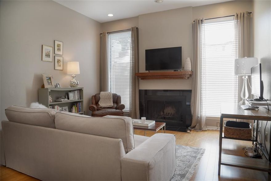 Cool condo nestled in the desirable Oak Lawn neighborhood, situated between Highland Park and Turtle Creek. This nicely maintained, top-floor residence features tall ceilings and large windows with custom window treatments. Generous living room with pretty bamboo floors, anchored by the fireplace & custom mantel. Separate dining area features designer light fixture & floor-to-ceiling window overlooks treetops below. Gourmet kitchen with custom cabinetry, granite countertops, & stainless steel appliances. Separate utility closet with stackable washer & dryer, and  built-in storage. Large primary suite features two separate closets with custom Elfa organization system. Spa-like bathroom with dual sink vanity, custom light fixtures, and skylight overhead. Nicely maintained eight-unit community with secured gated access. Ample storage throughout. Includes: washer, dryer, refrigerator, Nest Thermostat, & (1) reserved rear covered parking space (Space G). Walk to Whole Foods & nearby restaurants.  Close to Equinox Gym, One Lagree, & Training Mate fitness studio. Easy access to Uptown, Downtown, Tollway & 75 freeway. Less than 15-minutes from Love Field Airport and JSX Private Airport. Monthly water, sewer, trash included.