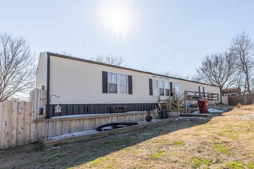 This property sits in the Holiday Village subdivision of Quitman and offers a 3 bedroom, 2 bathroom layout with a smart and functional design. The home features a split floor plan with a spacious primary suite complete with a large private bathroom and walk in closet. Two additional bedrooms share a convenient Jack and Jill bathroom. Enjoy a fully fenced backyard with a privacy fence, perfect for pets or outdoor entertaining. Holiday Village residents have access to a private boat ramp to Lake Fork, clubhouse, and community pool.