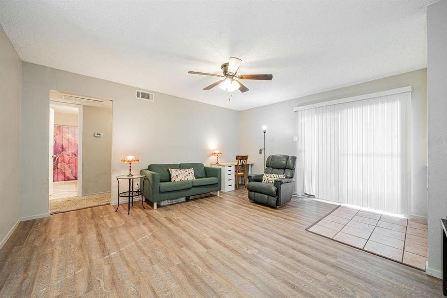 Discover effortless, first-floor living inside the gated Bent Tree Forest Condos community in your new 2-bedroom, 2-bath condo! The inviting living space is thoughtfully designed with natural flow and showcases a stylish wet bar with wine rack, glass-front cabinetry, and accent lighting, creating a perfect setting for entertaining or relaxing evenings at home. The light-filled eat-in kitchen features abundant cabinetry, a breakfast bar for casual dining, and a layout that balances function and comfort. Both bedrooms are generously sized, paired with two full baths that offer flexibility for guests, work-from-home space, or everyday living. The primary retreat is complete with two walk-in closets, and the oversized laundry room provides generous built-in storage, making daily living both stylish and practical. Step outside to a covered, fenced patio, an ideal outdoor retreat for morning coffee or winding down at the end of the day. Residents enjoy resort-style amenities including a community pool, hot tub, and tennis courts, all within a secure, well-maintained environment. Ideally located with quick access to the Dallas North Tollway, George Bush Turnpike, and I-635, and just minutes from shopping, dining, and entertainment, this home delivers low-maintenance North Dallas living in a great location. Proudly Claim Your Piece of Texas!  Covered parking space 194, uncovered parking space 196.