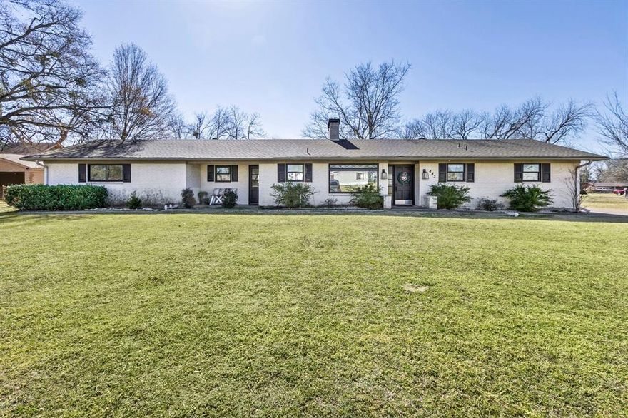 Stunningly Updated Ranch Home on a Near Half-Acre Lot!
Welcome to this beautifully renovated single-story brick home, perfectly situated on a generous city lot with mature pecan trees and endless potential. Offering approximately 2,200+ sq ft (per recent records), 3 bedrooms, and 3 full bathrooms, this 1965-built gem has been thoughtfully updated throughout while preserving its timeless charm.
The heart of the home is the expansive open-concept kitchen, living, and dining area. The chef’s kitchen features granite countertops, a large island, white shaker cabinets, a farmhouse sink, and a view straight into the living space with its striking brick fireplace. Adjacent dining includes a cozy built-in bench window seat – ideal for family meals or entertaining.
The primary suite offers a peaceful retreat with an updated en-suite bath. Additional bedrooms are perfect for additional or extended family, or a nursery-ready space. The den showcases office character and style. Updated bathrooms throughout feature modern vanities, quartz-granite counters, stylish tile, glass showers, and fresh paint.
Step outside to your private oasis: a massive fenced backyard with a covered patio featuring an outdoor kitchen-bar, seating area, fire pit, swing set, trampoline area, and room for a pool, garden, or whatever your heart desires. The driveway and carport provide ample parking.
This move-in-ready home blends modern updates with warm, family-friendly living in a quiet Fairfield neighborhood. Whether you’re raising a family, hosting gatherings, or enjoying low-maintenance Texas living, this property checks every box.
Priced to sell – schedule your private showing today! (Photos reflect current staging and updates.)
