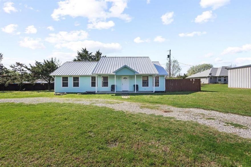 Lake life just got easy. Located in the highly desirable Simmons Shores community, this fully furnished 3-bedroom home offers the perfect blend of comfort, convenience, and Lake Texoma lifestyle. Whether you're searching for a weekend retreat, short-term rental opportunity, or full-time residence, this property is truly move-in ready—just bring your clothes and start enjoying summer at the lake.

Inside, the home features a bright open layout with durable LVP flooring and a spacious kitchen complete with quartz countertops, stainless appliances, and ample seating at the oversized breakfast bar. The split-bedroom floorplan provides privacy for guests while the dedicated laundry room adds everyday functionality.

Situated on nearly half an acre across four lots, the property offers a circular drive, fenced backyard, mature trees, and plenty of room for boat or RV parking—or even future shop space.

The location is hard to beat. Just a short golf cart ride to the private neighborhood boat launch, community pool, park, and pavilion. Popular restaurants and shopping are conveniently located just across from the neighborhood entrance, making lake weekends effortless.

Short-term rentals are allowed, HOA dues are only $120 per year, and every piece of furniture and décor is included—creating an ideal turnkey opportunity near Lake Texoma.