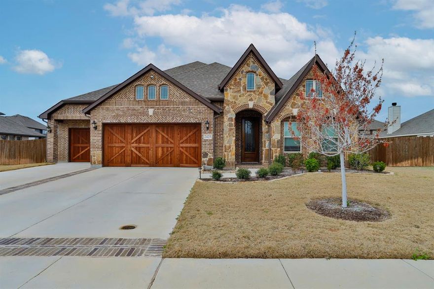 Stunning Stone & Brick One Story Home.  Nestled in the sought after Autumn Run neighborhood, conveniently situated near HWY 287 and FM 663. This residence boasts 4 Bedrooms, 2 and a half Bathrooms, along with Study or Bedroom and Dining Areas, complemented by a generous 3 car Garage. Revel in the warmth of Site Finished Wood Floors adorning the primary living spaces. The Study or Bedroom features classic French Doors. An airy, open layout welcomes abundant natural light through ample windows. Find solace under Vaulted Ceilings in the Family Room, accentuated by a cozy wood burning Stone Fireplace. Bathrooms and utility areas are adorned with larger format, upgraded tile. The expansive kitchen showcases Stainless Steel Appliances, a Subway Tile backsplash, and Level 3 Quartz countertops with Demi Bullnose edges. Storage is aplenty throughout the home. Other notable features include 2 inch faux wood blinds. Seize the opportunity and reach out today to discover more about this remarkable property.