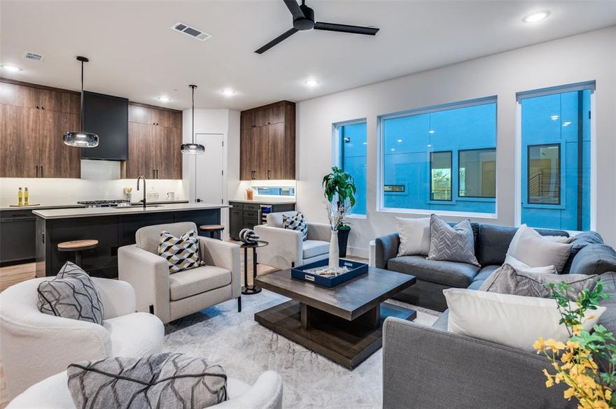 ***NEW CONSTRUCTION***** Discover this gated, modern, townhome-style condo in the heart of West Love-Medical District with rooftop views over looking the city! This chic property features 2 bedrooms, 2.1 bathrooms, a private fenced backyard, stunning white oak hardwood floors, and high-end designer finishes throughout. The open-concept kitchen boasts a large island, stainless steel appliances, quartz countertops, and one-of-a-kind custom cabinetry, seamlessly connecting to the spacious living and dining areas—perfect for entertaining. The luxurious primary suite impresses with vaulted ceilings, a walk-in closet, and a spa-like ensuite bath complete with a freestanding bathtub, dual sinks, and a large walk-in shower. The secondary bedroom also offers its own ensuite bath and walk-in closet for added convenience and privacy.