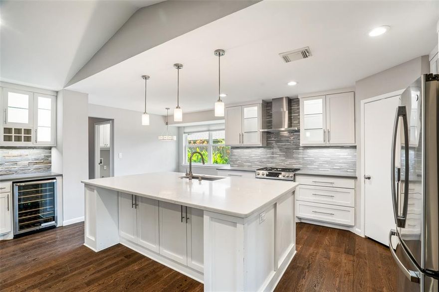 Discover this beautifully updated single-story Dallas home for sale, showcasing exceptional craftsmanship, modern upgrades, and an inviting open floor plan ideal for multigenerational living. Designed with comfort and elegance in mind, this residence features four spacious bedrooms, including a luxurious primary suite with two walk-in closets, a spa-style bathroom with a soaking tub, dual vanities, and an oversized glass shower. Natural light, designer paint, and custom lighting fixtures create a warm and sophisticated ambiance throughout.
The gourmet kitchen is a chef’s dream, featuring top-of-the-line stainless steel appliances, including a Bosch gas cooktop, double Bosch electric ovens, GE refrigerator, Maytag dishwasher, and built-in stainless microwave. Custom cabinetry, quartz countertops, and a designer tile backsplash elevate the space, while the adjacent breakfast room with a cozy fireplace provides a perfect setting for casual meals and gatherings.
Recent major upgrades include a new roof, HVAC system, wood flooring, and fully remodeled bathrooms. The home also features an owned security system for added peace of mind. Flexible living spaces include a private study with French doors, formal dining room, music or media room, and game room, offering versatility for today’s lifestyle. Expansive wall space allows for art displays or custom built-ins.
Move-in ready and thoughtfully updated, this Dallas, Texas home blends comfort, luxury, and functionality. Whether hosting family gatherings or enjoying quiet evenings, every detail enhances everyday living.
Nestled in a desirable Dallas neighborhood, this property offers easy access to top-rated schools, shopping, dining, and major highways—providing the perfect balance of style, convenience, and timeless appeal. Experience the best of Dallas real estate—modern design, premium finishes, and a true sense of home.