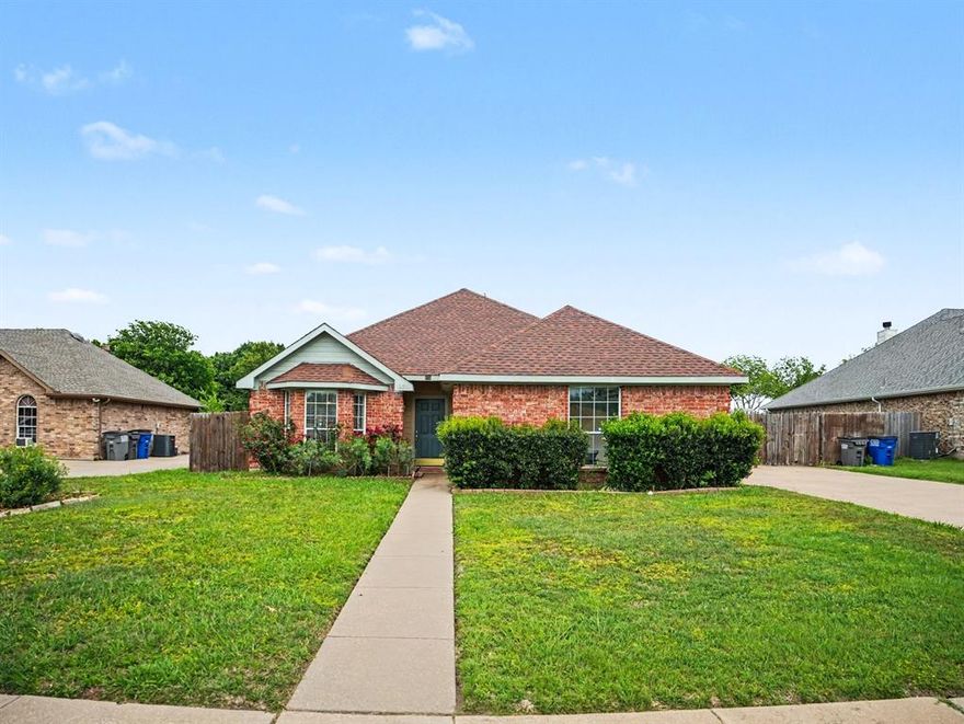 Charming single-story home located in the highly sought-after Red Oak ISD! This inviting property features a spacious combined living and dining area, perfect for entertaining or everyday living. The cozy living room is highlighted by a fireplace, creating a warm and welcoming atmosphere. The eat-in kitchen offers a comfortable space for casual meals and gatherings. The primary bedroom includes a private full bathroom, providing a relaxing retreat at the end of the day. Step outside to enjoy a large, fenced backyard—ideal for pets, play, or outdoor entertaining—complete with additional storage for your convenience. This home combines comfort, functionality, and great outdoor space—don’t miss the opportunity to make it yours!Discounted rate options and no lender fee future refinancing may be available for qualified buyers of this home.