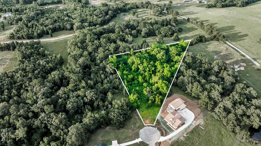 Located in a peaceful cul-de-sac within the scenic Star Mountain Ranch community, Lot 7 offers 5 wooded acres ready for your custom build. Surrounded by natural beauty, the neighborhood features gently rolling terrain, scenic ponds, and a quiet, rural atmosphere—perfect for those seeking space and privacy.

Enjoy the convenience of being just 10 minutes from Tyler, approximately 90 minutes from Dallas, and just over an hour from Shreveport. This prime location is also only 6 miles from UT Health North Campus, and close to shopping, dining, and entertainment options.