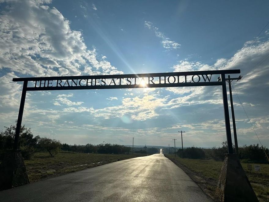 Adjacent 2 acres lot is also for sale. combines 4+ acres. The Ranches at Star Hollow is a beautiful acreage community located about 20 minutes
outside of Granbury, Texas.  Enjoy rural living with one large animal allowed per two acres, along with the option for chickens or a barndominium. stunning views, rolling pastureland, scattered hardwood trees. The community has asphalt paved roads, high-speed fiber-
optic internet, and private wells for water,The Ranches at Star Hollow emphasizes a low cost of
living and allows residents to build their dream homes now or later. Option to live in RV while you build is
allowed or You can choose your own builder. 1400 SF minimum on main dwelling. Excellent for rural lifestyle without compromising on convenience. This rural setting offers close proximity to shopping, dining & entertainment in Granbury and Fort Worth.