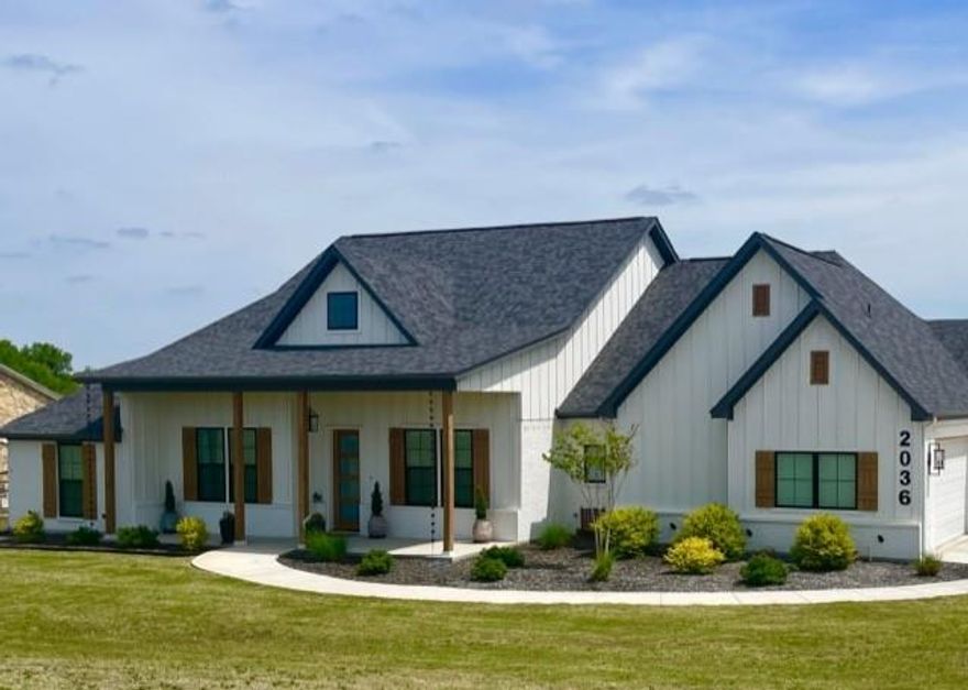 1.3 ACRES • STOCKED POND • WATERFRONT VIEWS- Homes with pond frontage and this much space rarely come available—schedule your showing and experience the view for yourself.

Waterfront living begins here. The peaceful pond creates a calming backdrop that turns everyday moments into something special. This home stands out with modern design paired with an already established setting and a premium waterfront view—offering a rare opportunity to enjoy both comfort and natural beauty.

This move-in-ready 4-bedroom, 2.5-bath home offers peaceful water views and a beautifully established setting that creates a rare sense of space and tranquility you can enjoy from day one.

Inside, the home showcases a thoughtfully designed open floor plan highlighted by a vaulted living room ceiling and elegant fireplace, creating a welcoming space for both relaxation and entertaining. The kitchen is equally impressive, featuring dual ovens, ceiling-height cabinetry, abundant storage, and a walk-in pantry, blending functionality with style.

The primary suite offers a private retreat designed with comfort in mind. The bathroom features a split vanity arrangement, pebble-stone walk-in shower, and a deep garden soaking tub for spa-like relaxation. The primary closet is enhanced with built-ins and extended hanging storage to the ceiling, while each secondary bedroom also includes custom closet organization systems.

Outdoor living is elevated with a covered patio complete with its own fireplace, overlooking the expansive backyard and peaceful pond setting. Whether entertaining guests or enjoying quiet evenings by the fire, the backdrop of water and trees creates a truly special environment.