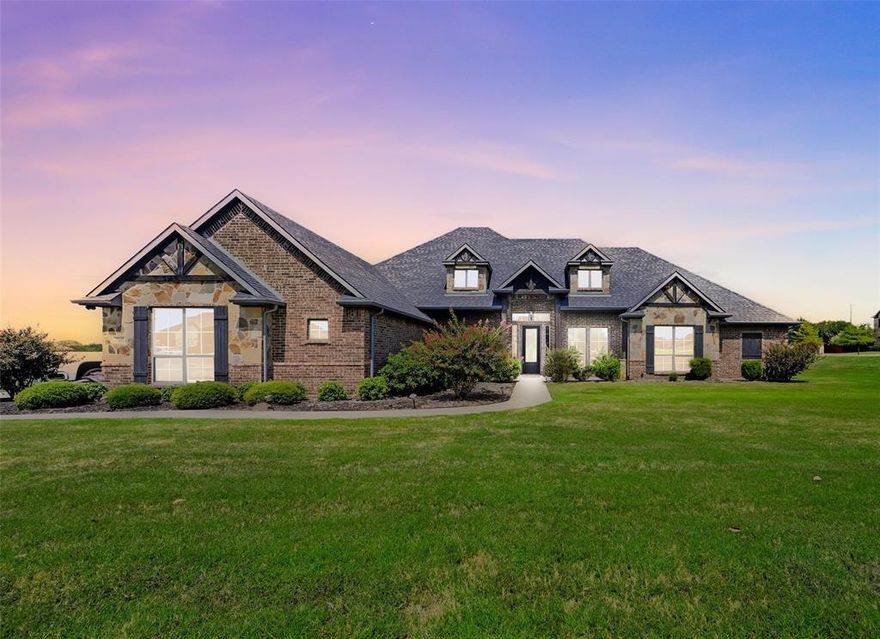 Welcome to this stunning 4-bedroom, 4-bath home on 1.1 acres in desirable Midlothian ISD. Situated on a corner lot, this property blends elegance, function, and space in all the right ways.
Step inside to soaring vaulted ceilings and hand-scraped solid wood floors that set the tone for the open, airy layout. The owner’s retreat is a true getaway featuring a spa-inspired bath with a stand-alone soaking tub and a walk-through shower with four shower heads. Three additional bedrooms, two with their own en-suite bathrooms, provide privacy and comfort for family or guests.
This home is as smart as it is beautiful, equipped with a full Ring camera system, Sonos amp and patio speakers, and three Euro smart home devices. Both garage doors feature MyQ openers that allow you to open and close them from anywhere—perfect for modern convenience.
The spacious 3-car garage offers plenty of room for vehicles, storage, or hobbies, while the expansive 1.1-acre lot creates endless opportunities for outdoor living, entertaining, or future pool plans.
This home checks every box for both luxury and everyday living—don’t miss your chance to make it yours!