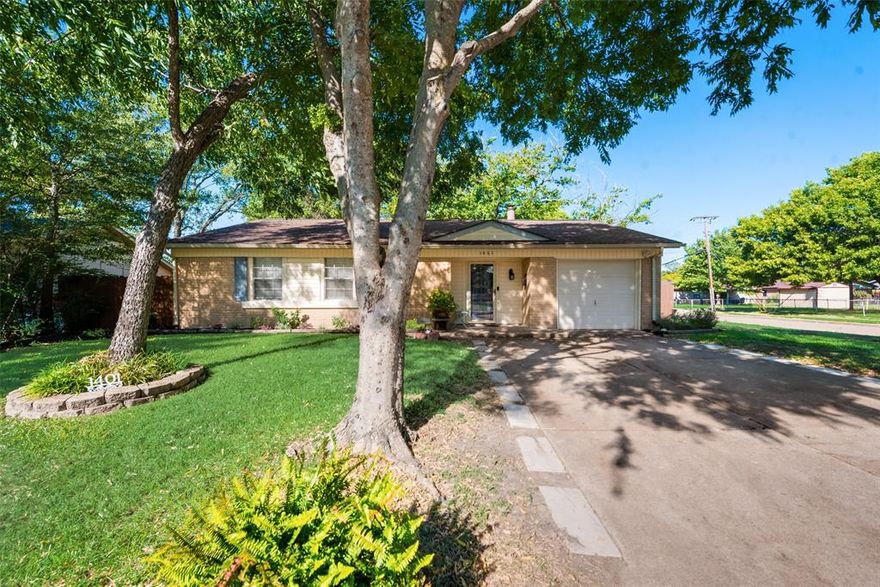 Come and see this great home on a large corner lot.  It won't be availible long. This house has four bedrooms with spacious closets.  The floors are laminate plank flooring, beautiful french sliding doors that go out into the tranquil back yard with many flower gardens and mature trees that provide lots of shade and relaxing atomosphere. Spacious large shed with electricity.  Wood fence surrounding with a double gate and a single gate.  The refrigerator, washer and dryer staying for the new owner.