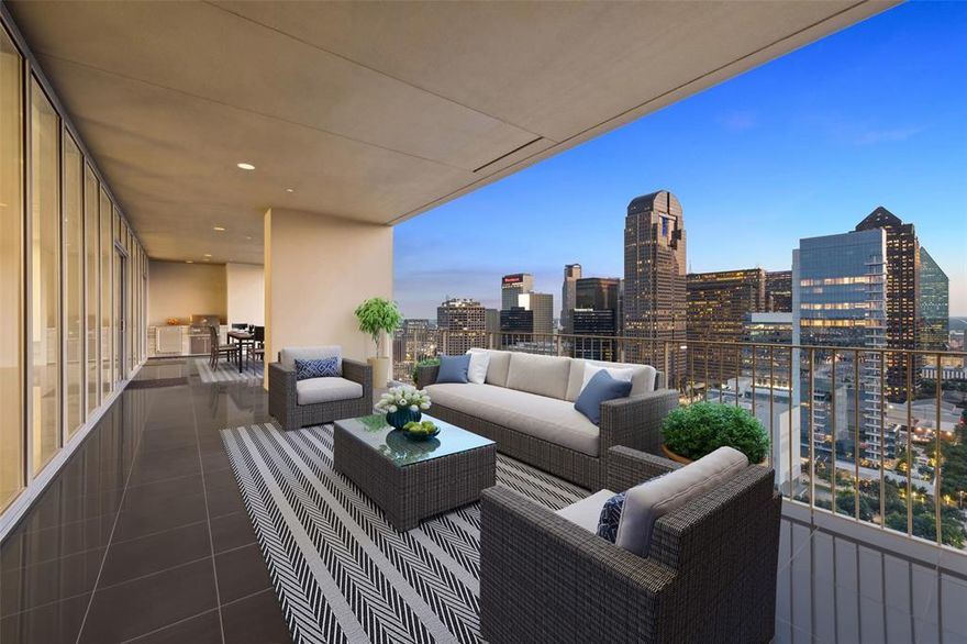 One Arts Plaza, The Premier Dallas Modern Hi-Rise, is located in the Dallas Arts District encompassing Performance Halls, Museums, Restaurants, Hotels & Klyde Warren Park. One Arts Plaza offers a Fabulous Social Community with Unparalleled Amenities & Elevated Services including: Rooftop Heated Pool, Fitness Center, and Clubhouse; 24-hour Valet with Covered Porte-Cochere, Doorman and Concierge; and a Private Lobby Entrance for residents. With only 60 residences in this exclusive building, a quick elevator ride up delivers you to your door or to the rooftop amenities level. Enter your home in the sky through a gallery hall that opens to an open floorplan living area defined by the floor-to-ceiling glass offering stunning views of the skyline, Trinity River, Klyde Warren Park and the Arts District. You and your visitors will enjoy: Smooth museum finish walls; 11’ ceilings; Motorized window shades; Kitchen with Miele and Sub-Zero appliances; Cappuccino machine; Bulthaup kitchen cabinetry; Gas cooktop with exterior venting hood; Stone countertops, Thermador wine chiller, Dedicated ice making machine; Smart home Sonos audio integration with iPad control; Lutron lighting, Outdoor kitchenette with gas grill and refrigerator; Whole-house 3M water filtration system; and Full size utility room and laundry with a separate hallway entrance. The full length covered balcony invites you with three doors from the inside to additional areas for relaxing, entertaining, and dining in front of a full skyline backdrop. Master suite features a generous marble bath and enormous wood paneled closet. Split two bedroom layout allows the second bedroom to double as a study with a fold down murphy bed.