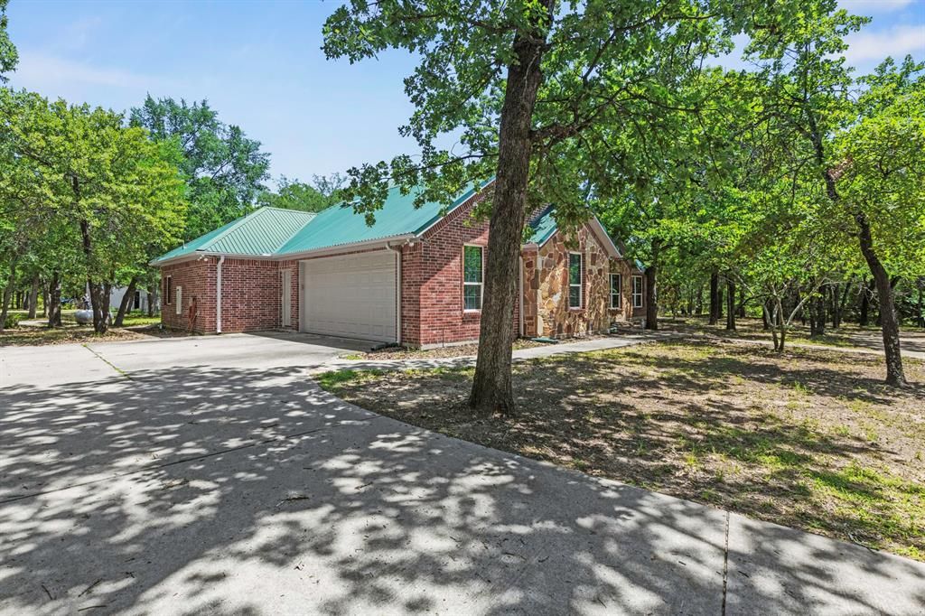 Photo of 6373 Hidden Oaks Drive, Quinlan, TX 75474 (MLS # 21271922)