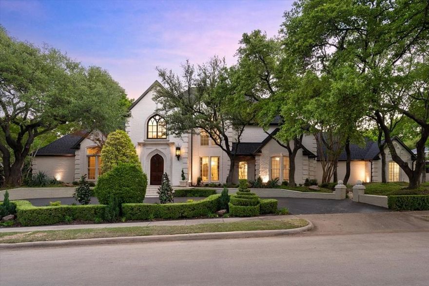 Introducing a quintessential home that embodies luxury living in the prestigious Glen Eagle Country Club of Plano. This stunning French country residence sits on an expansive corner lot in a tranquil cul-de-sac, covering 0.45 acres, & features captivating architectural design. With a circular driveway, majestic trees, & meticulously maintained landscaping, this property exudes curb appeal.
Step inside to discover a breathtaking foyer highlighted by an elegant iron staircase & exquisite marble floors. The sophisticated dining room seamlessly flows into the grand living area, complete with a cozy fireplace & magnificent views of the sparkling pool. The chef's kitchen is a culinary enthusiast's dream, boasting a fantastic bar, a spacious island, a butler’s pantry, & a wet bar equipped with dual wine coolers & a beverage fridge. Lots of ample storage in the large walk-in pantry, along with high-end appliances, including a commercial gas cooktop, microwave, double ovens & a brand-new Sub-Zero refrigerator.
The impressive family room features soaring ceilings, rich wood paneling & another inviting fireplace. The first floor has two spacious bedroom suites & a dedicated study. The master suite is a true retreat, offering a generous sitting area with picturesque views of the pool, as well as a luxurious bathroom complete with marble countertops, a soaking tub & his and her closets.
Upstairs has three additional bedroom suites & a versatile game or media room that comes with its own wet bar & refrigerator—perfect for entertaining. 
The newly updated backyard oasis is a true showstopper, featuring a large, covered patio, an elegant pergola, a stunning gazebo & a spectacular pool with an accompanying spa, complemented by five serene water fountains & lush gardens. Convenient pool bath, a spacious laundry room & new epoxy flooring in the garage. Amazing neighborhood. Top-rated Plano ISD. Quick access to all major Hwys, Plano's Legacy West, Dallas Cowboys & PGA HQs