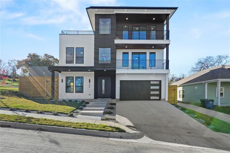 This exceptional four-bedroom  residence presents a striking modern contemporary design with refined architectural lines and high-end finishes throughout. Thoughtfully designed across three expansive stories, the home offers a seamless blend of sophistication, comfort, and urban luxury.
Situated on a prime corner lot, the property is flooded with natural light and offers unobstructed downtown Dallas skyline views from every window, creating a dramatic and inspiring living environment. The open-concept interior showcases clean lines, elevated ceiling heights, and a fluid layout ideal for both everyday living and entertaining.
The third-floor primary suite serves as a private retreat, featuring a spa-inspired bath, generous walk-in closet, and direct access to an exclusive wrap-around rooftop terrace. This outdoor living space provides panoramic city views and an unparalleled setting for relaxation or entertaining under the Dallas skyline.
Ideally located just 10 minutes from downtown Dallas, this residence offers convenient access to premier dining, shopping, entertainment, and major employment centers, while maintaining a sense of privacy and exclusivity.
This is a rare opportunity to own a design-forward urban home that combines architectural distinction, elevated living, and breathtaking city views in one of Dallas’s most desirable locations.