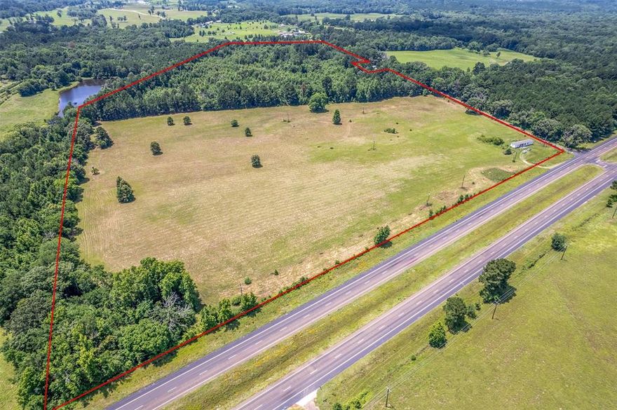 57.11 Acres with Prime Hwy 271 Road Frontage – Development Opportunity in East Texas! 

Introducing a rare opportunity to acquire 57.11 acres of versatile land located just south of Interstate 20 on US Highway 271, offering exceptional visibility and access. 

This property has 2 smapp ponds and offers over 1,200 feet of frontage on US Hwy 271 and approximately 1,800 feet of frontage on County Road 353, making it ideal for a wide range of potential development uses — residential, commercial, or mixed-use. 

With a strategic location in a growing corridor of East Texas, just minutes from Tyler and major thoroughfares, this tract offers both convenience and high traffic exposure, perfect for investors, developers, or end users looking to capitalize on future growth. 

This property is located in the Opportunity Zone as well as Tyler's ETJ. 

Utilities nearby – Buyer to verify availability. 

Don’t miss this opportunity to secure a large tract with significant road frontage and strong development potential in a high-demand area.