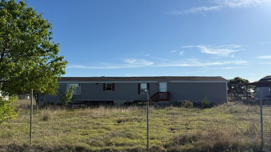 FULL ACRE offers room to roam and spread out Kaufman! Nestled on a scenic homesite with terrific views, 3377 Shiela Circle offers a unique opportunity to create something truly special. The property features a single-wide mobile home and plenty of open space, making it ideal for those with vision and creativity. Whether you’re looking to renovate, replace, or build your dream home, the possibilities here are limitless. Enjoy the peace and privacy of country living while still being within convenient reach of town. Bring your imagination and make this property your own!