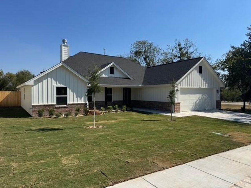 Welcome to Your Beautiful New Custom-built Home just minutes from downtown Weatherford! Designed with thoughtful detail and modern living in mind, this home offers an Open and Spacious Floor Plan perfect for comfortable living and entertaining. The heart of the home features a Lovely Kitchen and custom Island with Quartz Countertops, Stainless Steel Appliances, a Large Walk-In Pantry and soft-close cabinetry - the ideal space for creating meals and memories. The dining area overlooks the expansive backyard and covered patio, inviting you to enjoy evenings outdoors under the stars or host gatherings with friends. Relax and unwind in the living area highlighted by a beautiful wood burning fireplace with gas starter. The split bedroom arrangement offers privacy and convenience for all, with the primary suite showcasing a spa-like en suite bath, double sinks, a huge walk in shower and a spacious primary closet that conveniently connects to the laundry room. Thoughtful Custom touches are found throughout, adding character and quality craftsmanship to every space. There's even a mudroom, this home has it all! The Oversized Side Entry Garage easily accommodates large Texas Trucks and SUVs, perfect for today's lifestyle. This is truly The Home You've Been Looking For, offering Style, Comfort, and a location that combines Convenience with Charm. You Don't want to miss this One!