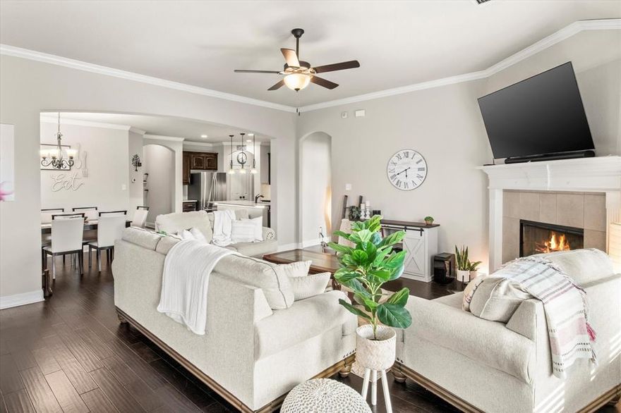 ALL APPLIANCES STAY - INCLUDING REFRIGERATOR, WASHER AND DRYER! This beautifully maintained 3-bedroom, 2-bath home in the sought-after Settlers Glen community. Built in 2017, this single-story residence offers 1,773 sq. ft. of thoughtfully designed living space with a warm, inviting feel. Step inside to find a spacious open-concept layout with abundant natural light, a cozy fireplace, and elegant finishes. The kitchen features modern appliances, ample cabinetry, and a breakfast bar, seamlessly connecting to the dining and living areas—perfect for entertaining or family gatherings. The primary suite is a peaceful retreat with a well-appointed en-suite bath. Two additional bedrooms and a full bath provide plenty of space for family, guests, or a home office. Enjoy the outdoors on your covered patio overlooking a well-kept yard, and a garage that faces the front for easy access. All furnishings, appliances, and even the dishes can stay, ask for those details