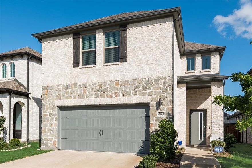 Welcome to this stunning two story home, boasting impressive curb appeal with charming brick and stone exterior. Step inside to an inviting open-concept main floor where the spacious living, kitchen and dining area seamlessly connect and ideal for both entertaining guests and comfortable family living. The main level also features a convenient half bath. Upstairs you will find all bedrooms thoughtfully situated for privacy and convenience. The primary suite has private ensuite bathroom with oversized shower, dual vanities and walk in closet. Two additional bedrooms provide plenty of room for family, guests, or home office. A versatile game room on the upper level provides perfect space for recreation, a media room or play area-tailor it to fit your lifestyle needs. The upstairs laundry room adds everyday convenience. A large backyard with an open patio is enclosed by wood privacy fence. Playset in backyard remains with property. New elementary school, Sara Moss,  is opening in the neighborhood Fall 2025.