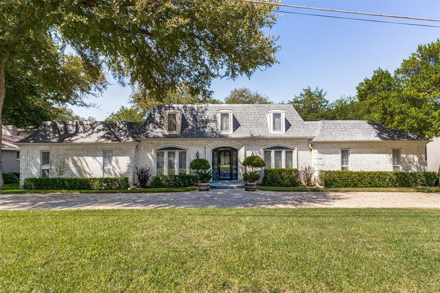 Incredible opportunity to be in one of Dallas great urban neighborhoods, on one of it's quietest streets & blocks + backing up to a creek & green belt, & very close to both White Rock Lake and Park, & Lakewood Elem. French American revival sits on a stunning oversized landscaped lot boasting old growth trees & stunning woodland views. Keeping up with the architectural style of the home, there is a French cottage style breakfast room with beamed rotunda ceiling as well as an awesome kitchen with vaulted cathedral ceilings. Home offers great separation of space for both family & guests w-2 bdrms that are connected by a Jack & Jill bath to the east & huge master to the west. Bonus is the attached 3 car garage. Don't miss this rare chance to be in one of Dallas's truly unique homes in this incredible setting, or the opportunity to start anew and build your dream home! 
RECENT INSPECTION REPORTS+FLOODWAY & EASMENTS DOCS AVAILABLE UPON REQUEST FROM PREVIOUS CONTRACT MARCH 2023.