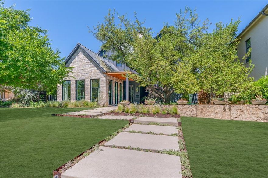 This Lakewood transitional modern designed by Wilson Fuqua and custom built by Montgomery Custom Homes in 2018 is an exemplary example of the finest design & craftsmanship. The front elevation was carefully planned around a live oak with a rare front courtyard setting great for front yard get togethers with the neighbors.  Janet Gridley interiors design group gave this home welcoming feel with natural tones and finishes. Cohesive design inside and out set this home apart from the rest. The home features an open floor plan with kitchen, dining and a large family room as the focus. Great for entertainment, the access to outdoor living through sliding doors takes you out to the spacious outdoor living area with fireplace and pool. The owner's suite gives a spa-like vibe with sitting area, vaulted ceilings, spacious bath with dual vanities, tub, separate shower and separate walk in closets. Special built-ins include murphy bed, bunk bed, & banquette seating. The study, also with en-suite bath can also be used as a fifth bedroom. Modern Lakewood living at it's finest!!