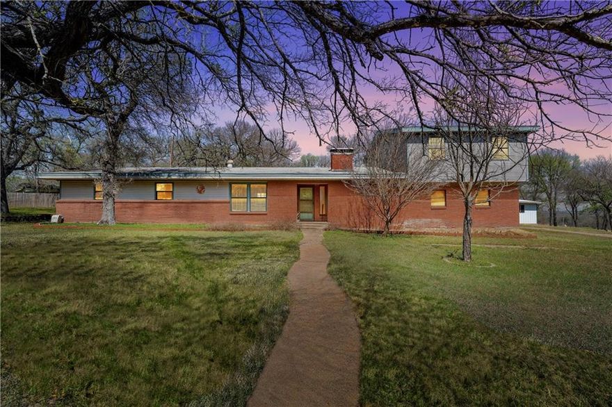 Location doesn't get much better than this!  This property is located at the end of a quiet street and is neighbored on one side by a large tract of land.  This 3-bedroom, 3-bathroom home sits on .84 of an acre allowing for plenty of outdoor space.  The home has 2 bedrooms and 2 bathrooms downstairs and a large bedroom with its own bathroom upstairs.  The upstairs space could be used in so many ways - playroom, game room, hobby room, etc.  The kitchen has space for a breakfast area/informal dining area and also a formal dining room.  Need a 4th bedroom or office?  No problem, as the formal dining room could be converted very easily, and you'd still have space for a dining area.  The living room has a unique multi-sided wood burning fireplace to keep you warm in the winter.  The primary suite has plenty of space and has its own bathroom.  Outside, you will find a nice metal shop with electricity as well as a storage shed and fenced back yard.  This Robinson ISD home is located 5 minutes from Robinson and a few more minutes into Waco.  This property is truly unique!