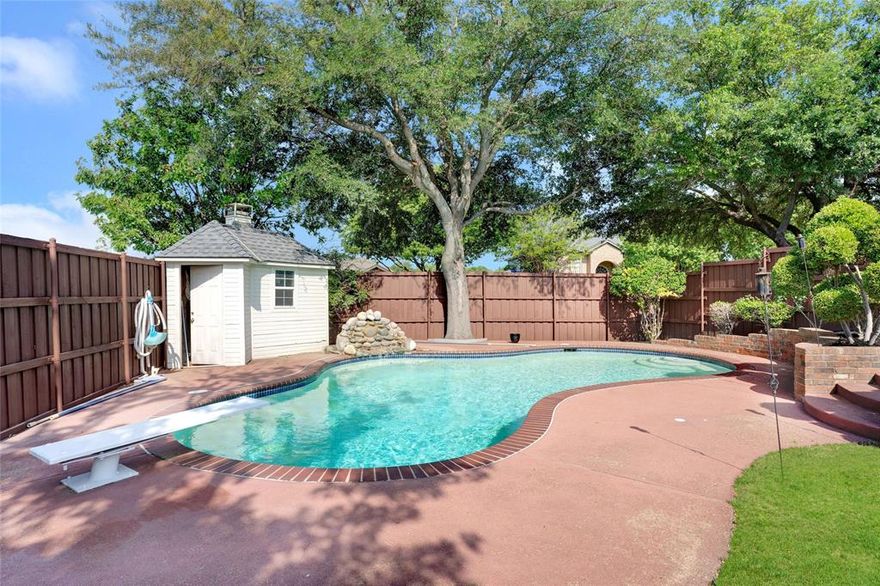 Corner lot with mature live oak trees to shade the backyard.  4-bedroom with POOL.   Large downstairs primary bedroom suite with corner jetted tub, wonderful walk-in shower, quartz countertops, dual sinks. 2 dining areas, a downstairs flex room that could be a
perfect home office, and a family room with a gas fireplace and views of your pool. You will appreciate the light, bright
kitchen with SS appliances and gas cooking. Head upstairs to discover 3 bedrooms, a full bath, and a game room.
Convenient location! Step out your front door to bike, run, or walk along the greenbelt trail just across the street.  One Year old roof.