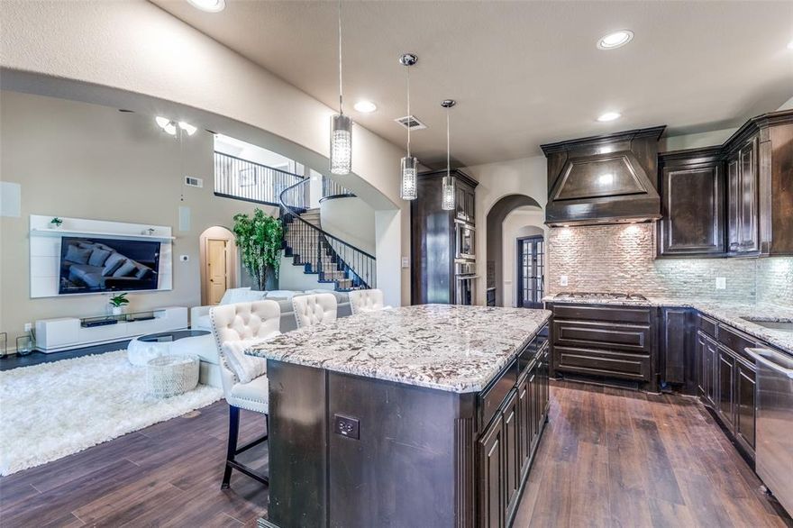 Bring us your offers!! Welcome to this elegant 2-story home centrally located in Prestwyck between the N Dallas Tollway and 75 Central Expressway in the highly sought-after Prosper ISD, walking distance to Prestwyck Park and Elementary! This stunning 5-bedroom(One bedroom has custom built ins!), 4-bath residence features luxury lighting-complemented by vaulted ceilings, a cozy gas fireplace, and a dedicated theater room. Enjoy the convenience of an office space along with beautiful details such as, a custom room that has been designed by Dallas Custom Closets, wrought iron banisters, crown molding, plantation shutters, and impressive dark wood finishes. The gourmet kitchen boasts granite countertops, a large island, double ovens, 42-inch cabinets, a stylish stone backsplash, and a butler's pantry. High-energy efficiency features include a tankless water heater system, water filtration system, and Energy Certified AC units, the roof was replaced October 2025 and gutters were added. Plus, all furniture is negotiable! Don’t miss your chance to own this dream home in the growing city of McKinney, just minutes way from PGA Frisco and the new upcoming Universal Kids Resort!