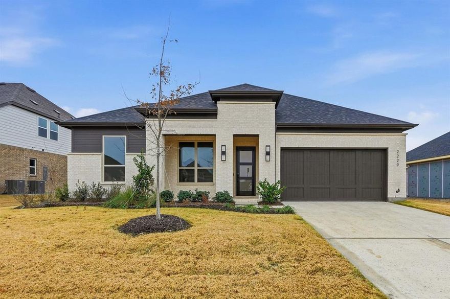 An exceptional opportunity to own one of Ridge Crossing’s most thoughtfully designed floorplans, now offered at a compelling value. Ask the Sales Team about our current financing incentives! Welcome home to the stunning Birchwood plan in the boutique community of Ridge Crossing. Enjoy community amenities including a pickleball court, playground, scenic walking trails, & a low tax rate with no MUD or PID! Situated on a quarter-acre lot, this beautiful single-story home offers 2,816 sq ft of thoughtfully designed living space & a 3-car tandem garage. Modern curb appeal includes Silverado brick, Onyx black roof, cedar garage door, & covered front porch. Inside, tall ceilings, dramatic entryway, & a private study set the tone for modern elegance. Each secondary bedroom features a private en-suite bath, a truly unique feature on a 1-story home. Plus a convenient powder room for guests. Designed for entertaining, the open dining and family rooms showcase soaring 16-foot vaulted ceilings with wood beams, a ceiling-height gas fireplace, & sliding glass door leading to an extended covered patio complete with gas line. The chef-inspired kitchen impresses with a large island, double ovens, 5-burner gas cooktop, stacked upper cabinets, a hutch, & backsplash extended to the ceiling. An entertainment room adds flexible living space. The secluded primary suite offers a spa-like bath with soaking tub, walk-in shower with tiled pan, dual vanities, & a walk-in closet with ceiling-height storage. Sleek black hardware throughout enhances the home’s modern, cohesive design. Additional highlights include a spacious utility room pre-plumbed for a future sink & abundant storage throughout. Contact the Sales Team today for details on current incentives & to schedule your tour.