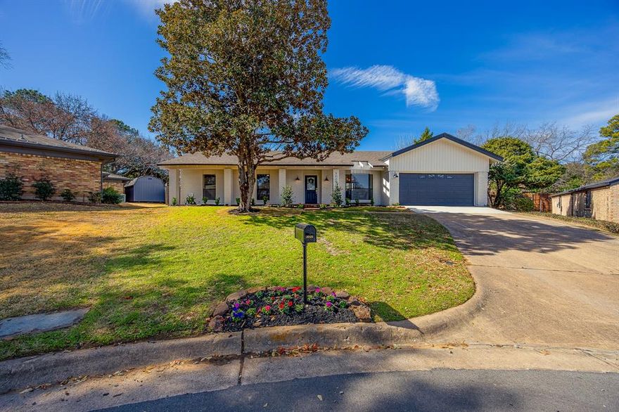 Stunning fully renovated 3 bedroom, 3 bath with additional home office or flex space. This showstopper home is nestled withing walking distance of the shores of Grapevine Lake. Situated on a generous sized private lot with close access to walking & hiking trails. Soak up the tranquility of this serene home within every ounce of space this peaceful home offers. From the front covered porch to the soaring open main living area & kitchen. Curl up in a comfy spot in the sunroom or retreat to the spa-like oversized owner suite & ensuite luxurious bath. This home has a place for everyone to spread out & enjoy in their own way. The home is filled with light filtering windows which beckon you outside at every turn. The kitchen is every chefs dream to whisk up their favorite creations in with an abundance of counter tops, built-in trash drawer, wine cooler, microwave & so much more. With a promise to delight just as much inside as outside, this home truly has it all. Just a few minutes drive to all the shopping, dining & entertainment experiences of Downtown Grapevine & Southlake, you truly have it all right here waiting for you to call home. *Buyer & buyer's agent to verify schools & square footage.