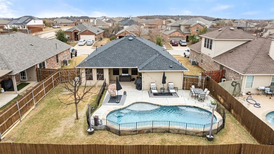 This beautiful single-story home features 3 bedrooms, 2 bathrooms, with great curb appeal, attractive landscaping and a long driveway for extra parking. The living area includes an electric fireplace that was added in 2023. The backyard is beautiful with an extended patio that opens to a beautiful  inground pool (installed in 2022) with lights. Additional updates also include a new roof in 2024. Come check out what this home has to offer! Seller does have Survey!