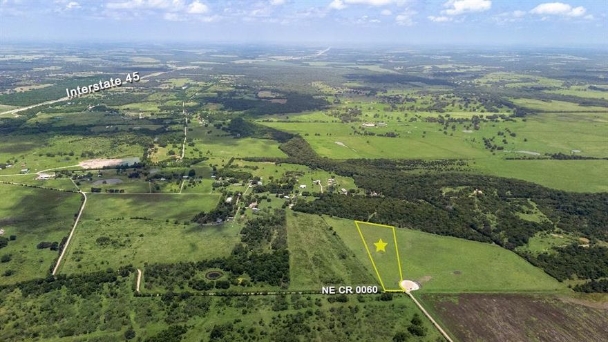 Just minutes from I-45, this beautiful 5+ acre tract offers the perfect balance of convenience and privacy. Enjoy easy access to town while still being tucked away from the hustle and bustle of daily traffic. Utilities are ready to go — electricity and water are available at the road. Light restrictions are in place, and mobile homes are welcome. ***Seller Financing Available***