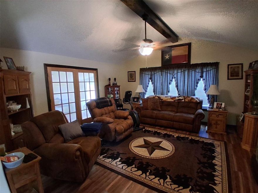 Country living with room to breathe!!!!Beautiful renovated property sits on over 2 acres. Welcome to your slice of Texas and bring your horse. No HOA and no restrictions. This 3-bedroom home has plenty of room for all those family gatherings. This home is located far enough away from the hustle and bustle of the city yet close enough for shopping and the eateries. With formal dining room or 2nd living room. The primary living room is quite large with a wall of windows great for reading or relaxing. It is equipped with an additional room that would be great for a 4th bedroom, game room, sunroom, or office. The double sets of French doors, custom knotty pine cabinets, vinyl plank flooring, and wood trim give it that country feel. Don't miss out on this terrific gem. Book your showing today!!!

Buyer and buyer's agent will need to verify all information including but not limited to measurements. All information deemed reliable but not guaranteed.