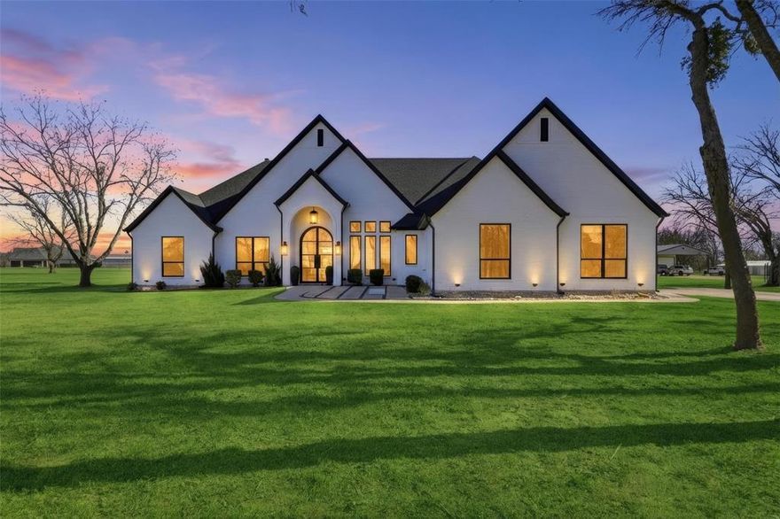 Still searching for the perfect one-story home with a true FLEX room or home office? 
This is the one—2,948 sq ft of custom craftsmanship set on a secluded 2.6+ acre, partially wooded homesite with NO HOA. 
Step inside and you’re immediately welcomed by a dedicated office just off the entry and thoughtful architectural details that make every space feel elevated and intentional. The spacious living room is filled with natural light from large custom windows and features soaring cathedral ceilings plus a showstopping floor-to-ceiling porcelain tile gas fireplace. Designed for both everyday living and entertaining, the chef’s kitchen offers custom cabinetry, a large pantry, generous counter space, a gas cooktop, and a pot filler. The dining area flows effortlessly to the covered outdoor patio, where you can grill, unwind, and enjoy nights by the outdoor fireplace under the stars. Virtual walk through tour link available. Please request with your Real estate agent.

The primary suite is a true retreat with a spa-inspired bath featuring a soaking tub, oversized shower, and an impressive walk-in closet.
Rarely does a home combine single-story living, custom finishes, acreage (almost 3 acres), no HOA, and exceptional outdoor space like this.
 Schedule your private tour today and experience it in person.