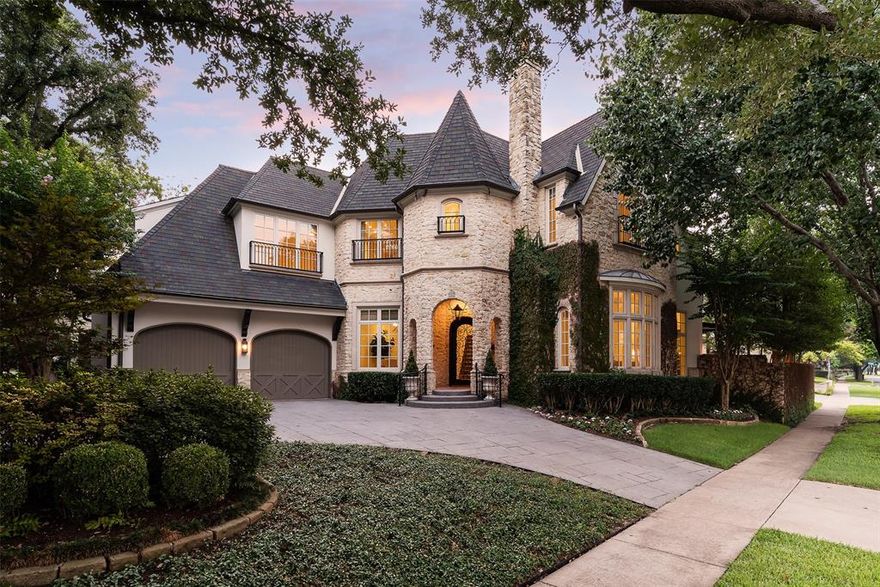 This recently refreshed property built by Goff Custom Homes perched on a 67' wide corner lot in Highland Park offers timeless architecture and a commanding presence. Impressive drive-up with front circle drive and beautiful landscaping leads to foyer entry flanked by split formal dining and living areas and a library. Gourmet island kitchen with natural stone counters, gas range, stainless appliances.  Large great room with antique beamed ceiling and fireplace is open to the breakfast area and has views of the pool. Screened loggia with wood burning fireplace opens to the backyard, pool and glass covered patio with cooking area. Master suite with sitting area, fireplace, marble master bathroom and large closet.