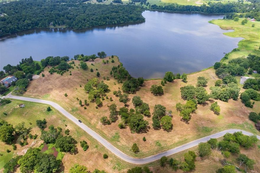Rare opportunity for waterfront on a quiet lake with beautiful views in a spacious neighborhood! Nestled on Lake Tankersley in Northeast, Texas, this attractive, gently-sloped 1+ acre property has access to 116.53 feet of shoreline. Carolina Way is a new subdivision offering oversized lots, making it the perfect place to spread out & build your dream home. While it is tucked away in a peaceful lake retreat, the conveniences of town are not far away, including shopping, dining, and healthcare. Come fish, relax and stay a while...waterfront lots are limited so give us a call today!