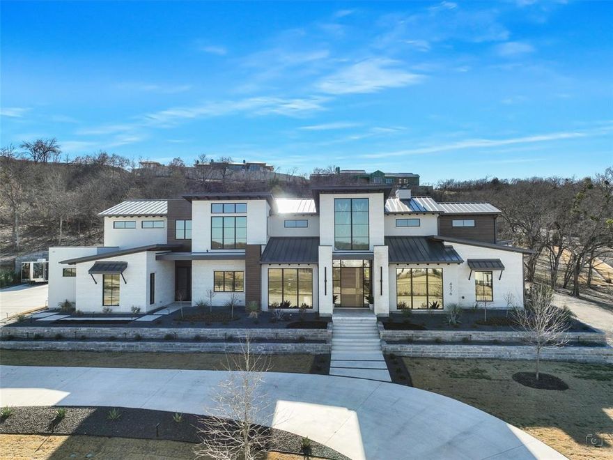 A masterpiece built by Heritage Homes of Southlake. The gourmet kitchen is equipped with Thermador
 appliances, and a separate prep kitchen, perfect for effortless entertaining. The Primary suite boasts a
 stunning custom closets by Closet Envy, offering both style and functionality.
 Thoughtfully designed with quality in mind, this home showcases exquisite Pella Windows, a striking custom
 front door, and a secluded all-turf backyard for ultimate privacy. The breathtaking pool and hot tub,
 complete with a swim-up bar.