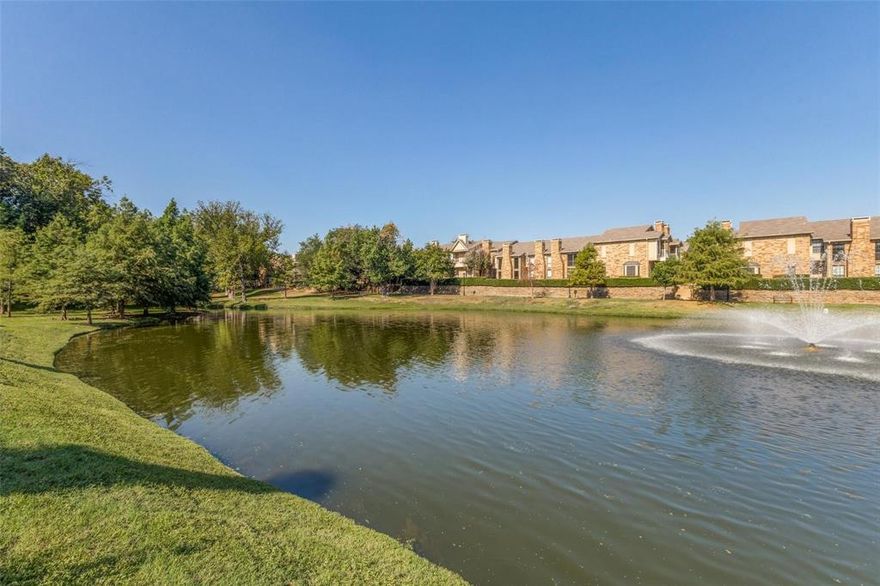 Hidden gem in the heart of North Dallas! Enjoy peaceful views of the water and fountain from your living, dining and kitchen, or while relaxing with a cup of coffee on your large, covered patio. This first floor condo features an open concept floorplan, abundant natural light, and no carpet throughout. 2026 updates include fresh interior paint and an updated kitchen and bathroom. The generous primary suite offers two closets with an ensuite bath. Residents enjoy access to the community pool and hot tub, plus one assigned covered parking space. Ideally located just minutes from Addison with easy access to shopping, dining, and major highways. Low HOA dues include water, sewer, trash, landscaping, pool maintenance, roof, and foundation, making this an exceptional value in a prime location.