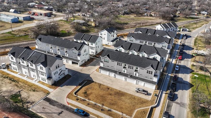 Enjoy stunning aerial views of Tarleton University—just minutes from your future home at The Purple Rail. Now leasing for Fall 2025–2026!
Secure your spot today with a holding fee while you search for roommates, or rent individually without needing to fill every bedroom. Each unit is leased by the room with flexible, individual contracts—perfect whether you prefer to live solo or with friends. Roommate information is provided before signing to ensure a comfortable and compatible living. These 3-story townhomes, located just 0.4 miles from Tarleton University, feature 3-bedroom, 3.5-bath layouts 1,938 sq. ft and 4-bedroom, 4.5-bath layouts 2,911 sq. ft., with 2 and 3 car garages, keyless entries, zoned heating and air on each floor, accessing garage remote,  Designed with both comfort and style in mind, these townhomes offer open floor plans with 10-foot ceilings, large windows providing abundant natural light, ceiling fans, and recessed lighting throughout. Kitchens are equipped with island bars, electrical outlets, granite countertops, and ample cabinet space, ensuring a functional yet elegant cooking area. Each townhome includes top-quality appliances, such as a refrigerator, oven, microwave, dishwasher, and a full-size in-unit washer and dryer. Pets are welcome with owner approval, with a refundable deposit based on size and breed—plus no monthly pet rent! Rent covers water, trash, sewer, and internet, and you can choose their energy provider for additional savings.  Our easy-to-use portal simplifies rent payments and maintenance requests, keeping everything manageable online. Pricing for 3-bedroom units: Room A - $725 (no garage), Room B - $875 (garage), and Room C - $800 (garage), totaling $2,400. For 4-bedroom units: Room A - $900 (garage), Room B - $850 (garage), Room C - $650 (no garage), and Room D - $800 (garage), totaling $3,200.
Application Fee is $80  for a credit report for appicant and co-signer.  $600 refundable deposit.