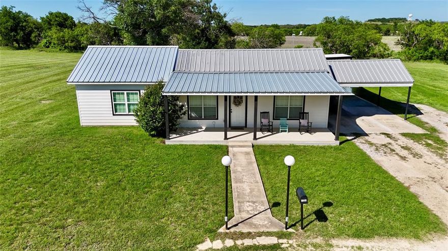 Charming Farmhouse on Acreage with Commercial Potential – Early, TX

Welcome to 700 Garmin Dr., a beautifully remodeled farmhouse nestled .63 scenic acres just outside of town—yet conveniently located within the city limits of Early, Texas. This unique property offers the perfect blend of peaceful country living with valuable commercial opportunity.

The  1384 sq. ft. home has been thoughtfully updated and features a spacious primary suite with an en suite bath complete with double vanities, granite countertops, a large walk-in shower, and stylish finishes. The home showcases a blend of laminate, carpet, and tile flooring throughout, along with a warm, modern farmhouse design.

The kitchen is a standout, offering granite countertops, subway tile backsplash, stainless steel appliances, and a tasteful color palette of light gray, white, and black accents. The open-concept layout seamlessly connects the kitchen, dining, and living areas—ideal for both everyday living and entertaining.

Additional highlights include:
    •    New AC unit (less than 1 year old)
    •    Spray foam insulation in the attic, gables, and primary suite walls for energy efficiency
    •    Pier and beam foundation with slab foundation under the primary suite addition
    •    Second bathroom with tub-shower combo
    •    Large laundry room and convenient mudroom

Step outside to enjoy  a fenced and cross-fenced backyard, complete with a dog run and plenty of space for children to play. The property also features an attached carport, a charming front porch, metal roof, and a circular drive for easy access.

Positioned in the center of the acreage, additional land on both sides of the home is available to purchase as well.

Properties like this don’t come along often. Whether you’re looking for a homestead, business opportunity, or both—this one is a must-see!  Additional acreage available.. Contact Agent for More Information.